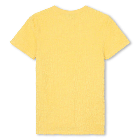 Vestido amarillo con múltiples logotipos de Marc Jacobs